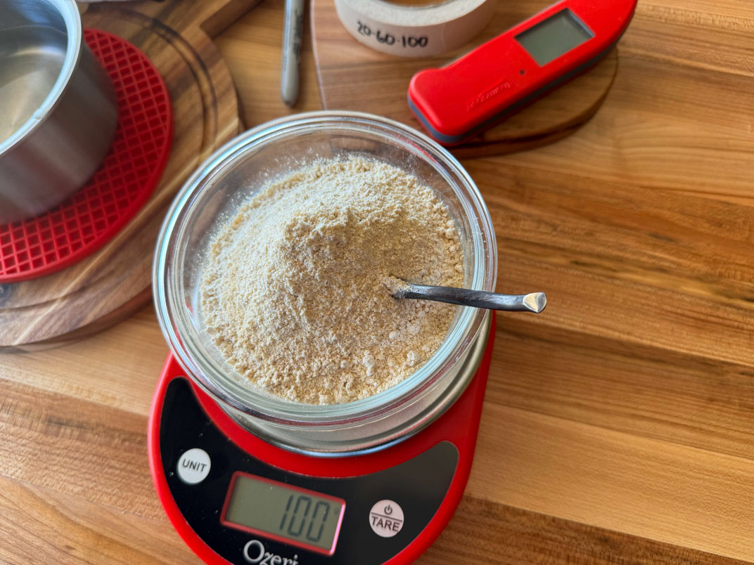 IMG_0120 adding einkorrn wheat flour to refresh your sourdough starter