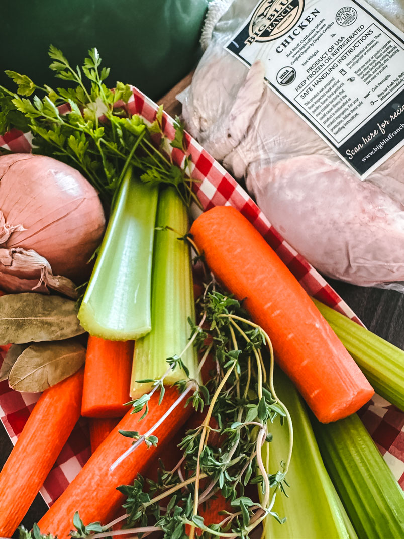 carrots, celery, onion, thyme, and whole chicken for chicken broth