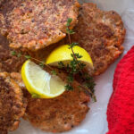 Wild Salmon Burgers with Thyme and Lemon and a red towel