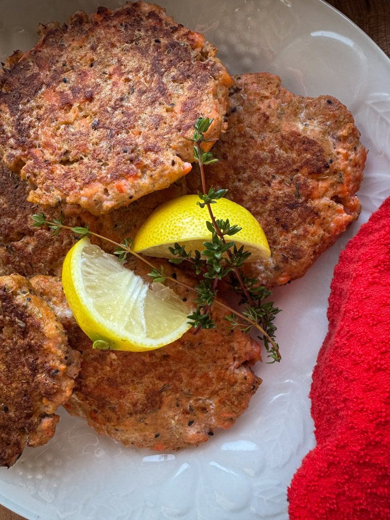 Wild Salmon Burgers with Thyme and Lemon and a red towel