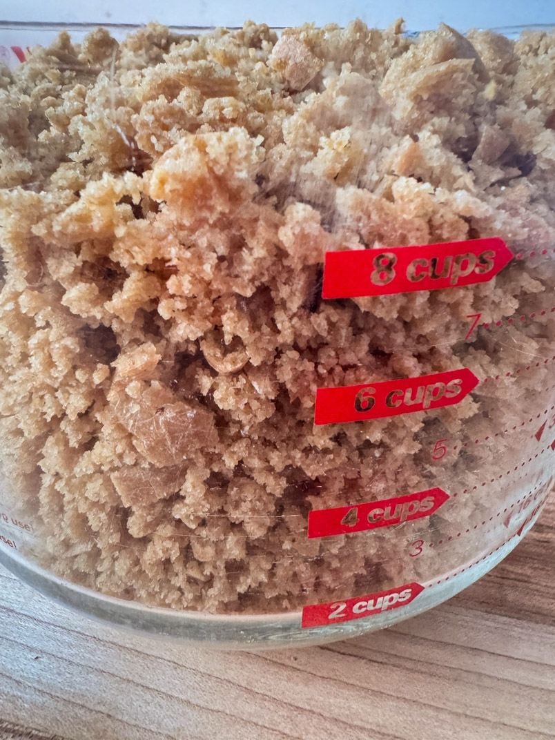 sourdough breadcrumbs in a measuring bowl