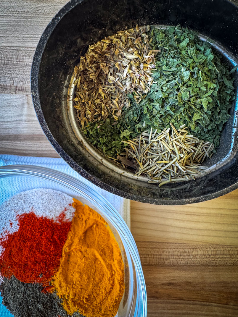 Rosemary and parsley in grinder