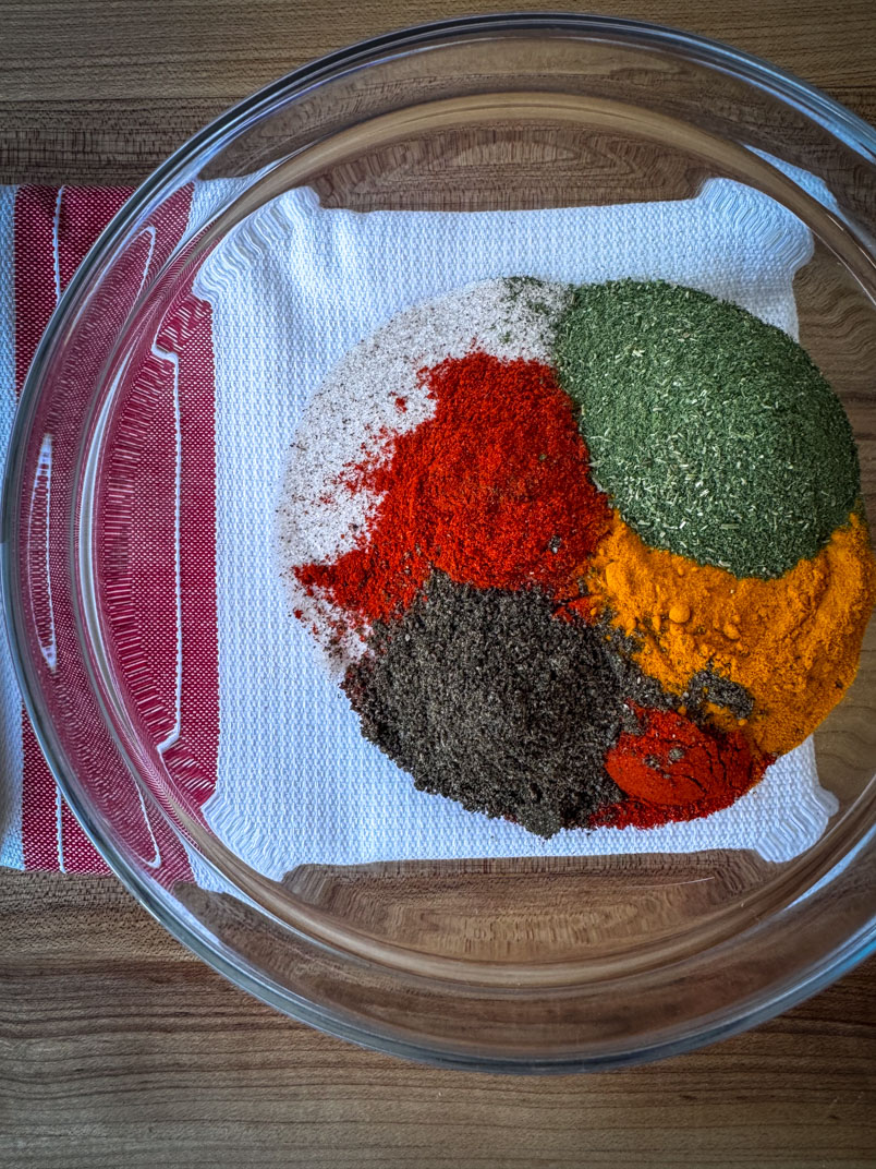 Layering spices for Homemade All-Purpose Season Salt.