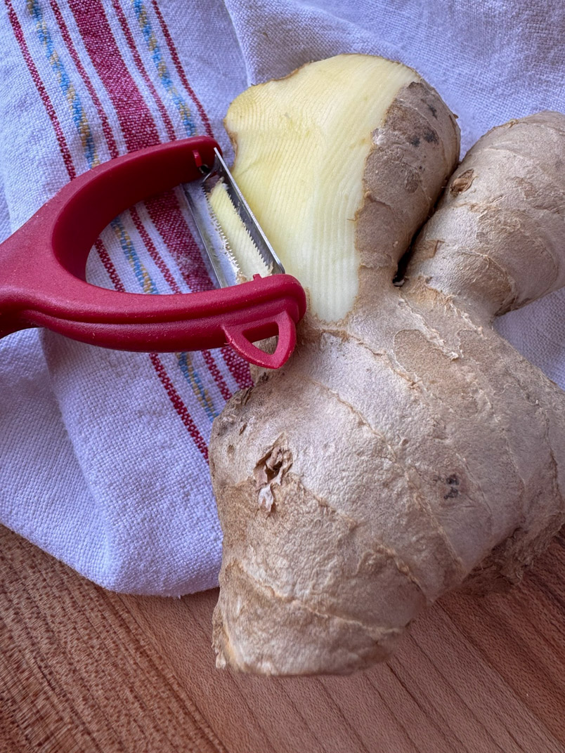 peeling ginger peeling ginger