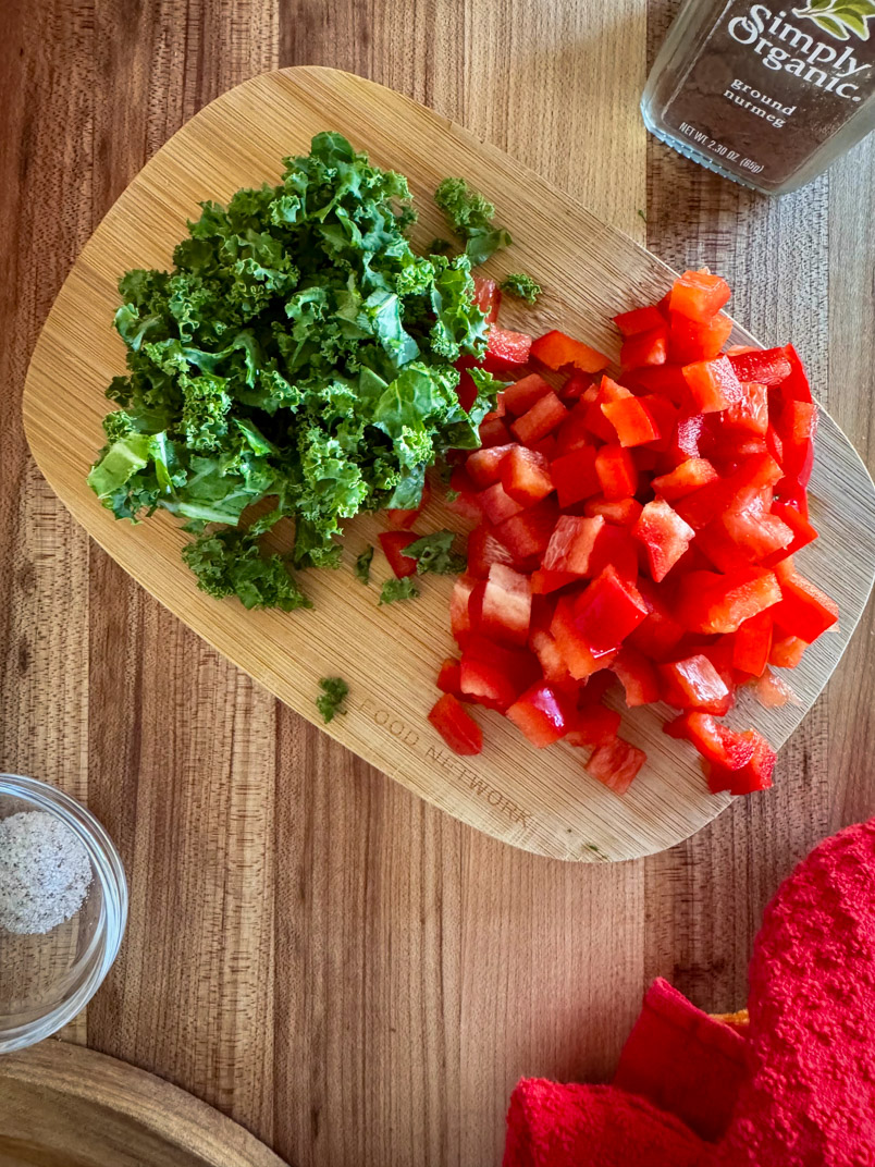 chopped bell peppers and kale