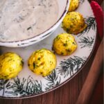 homemade chive and arugula dip with loaded potato bites