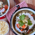 High protein lentil soup with chicken. Topped with yogurt and mozzarella.