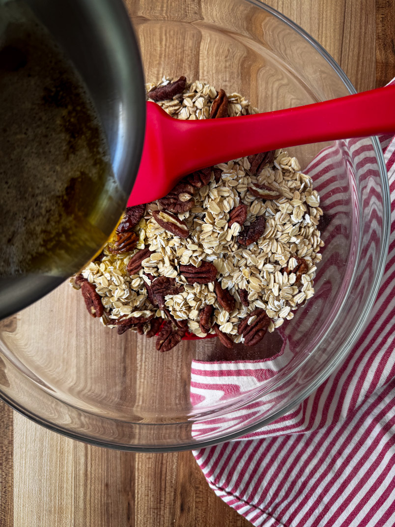 add sweetener to oats and pecans for maple pecan granola add sweetener to oats and pecans for maple pecan granola