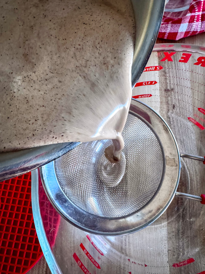 straining the hot date drink straining the hot date drink