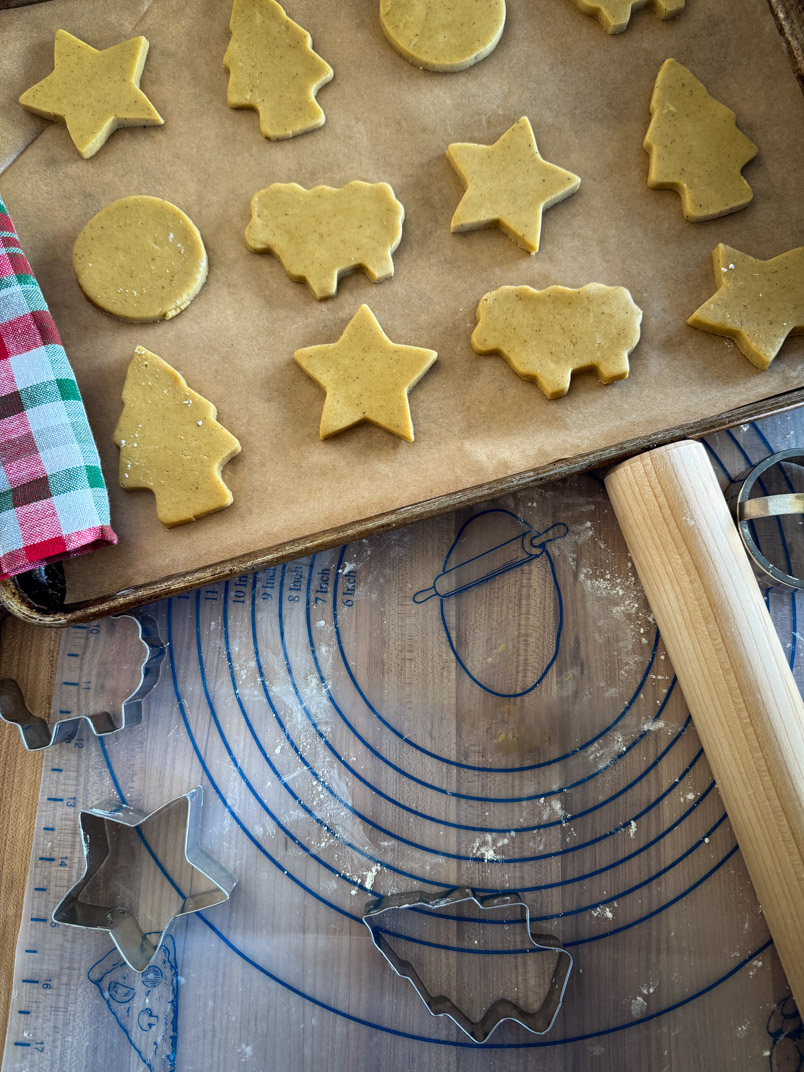 einkorn cookie dough cut into Christmas Shapes