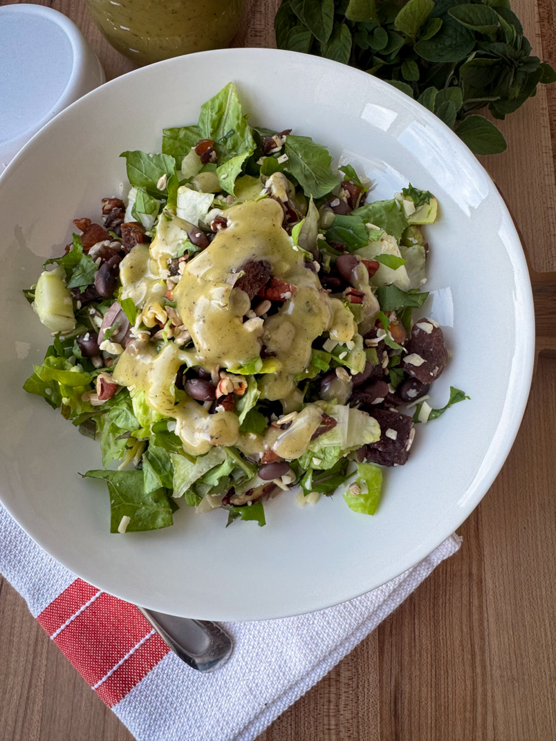 oregano vinaigrette salad dressing on a homemade salad oregano vinaigrette salad dressing on a homemade salad