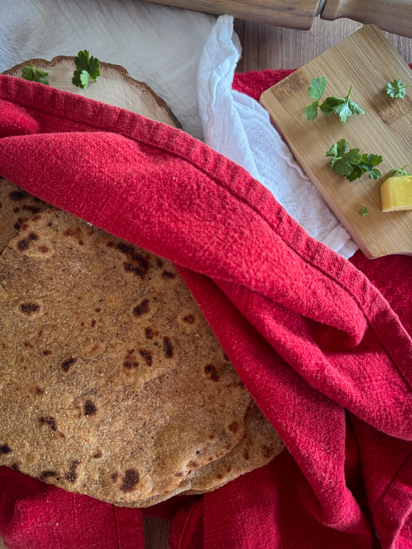 healthy flatbread cooking and covered with a towel to stay soft