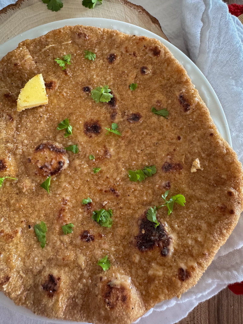 Einkorn Flatbread rubbed with butter and sprinkled with parsley
