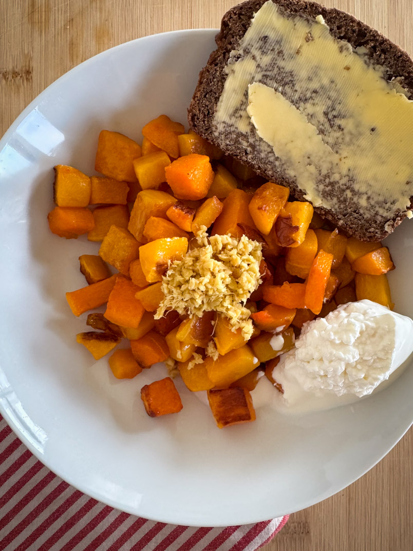 roasted butternut squash lunch with cottage cheese, einkorn and rye bread, and fermented ginger