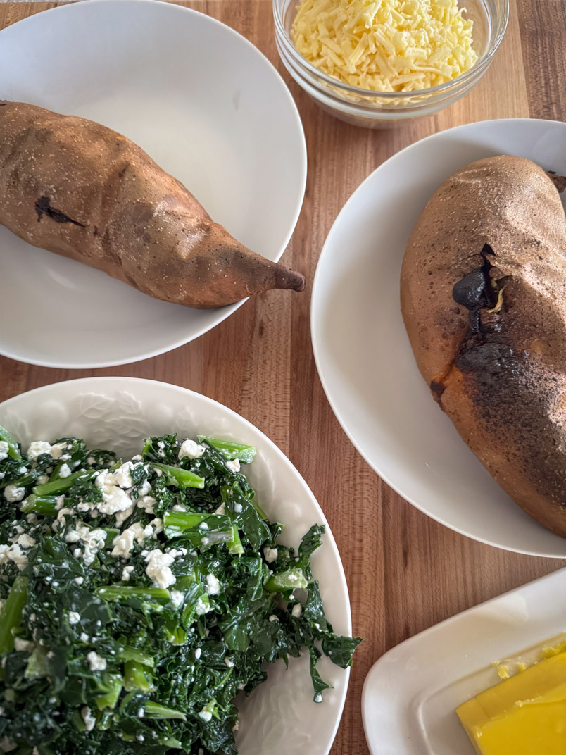 white fleshed sweet potatoes topped with kale and cottage cheese